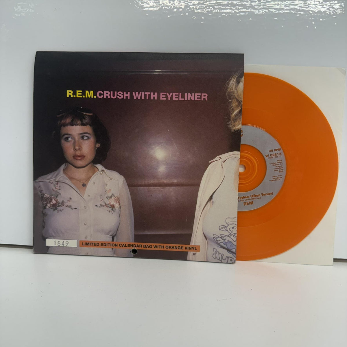 R.E.M. - Crush With Eyeliner Limited 7" Orange Vinyl Single + Calendar Poster Bag