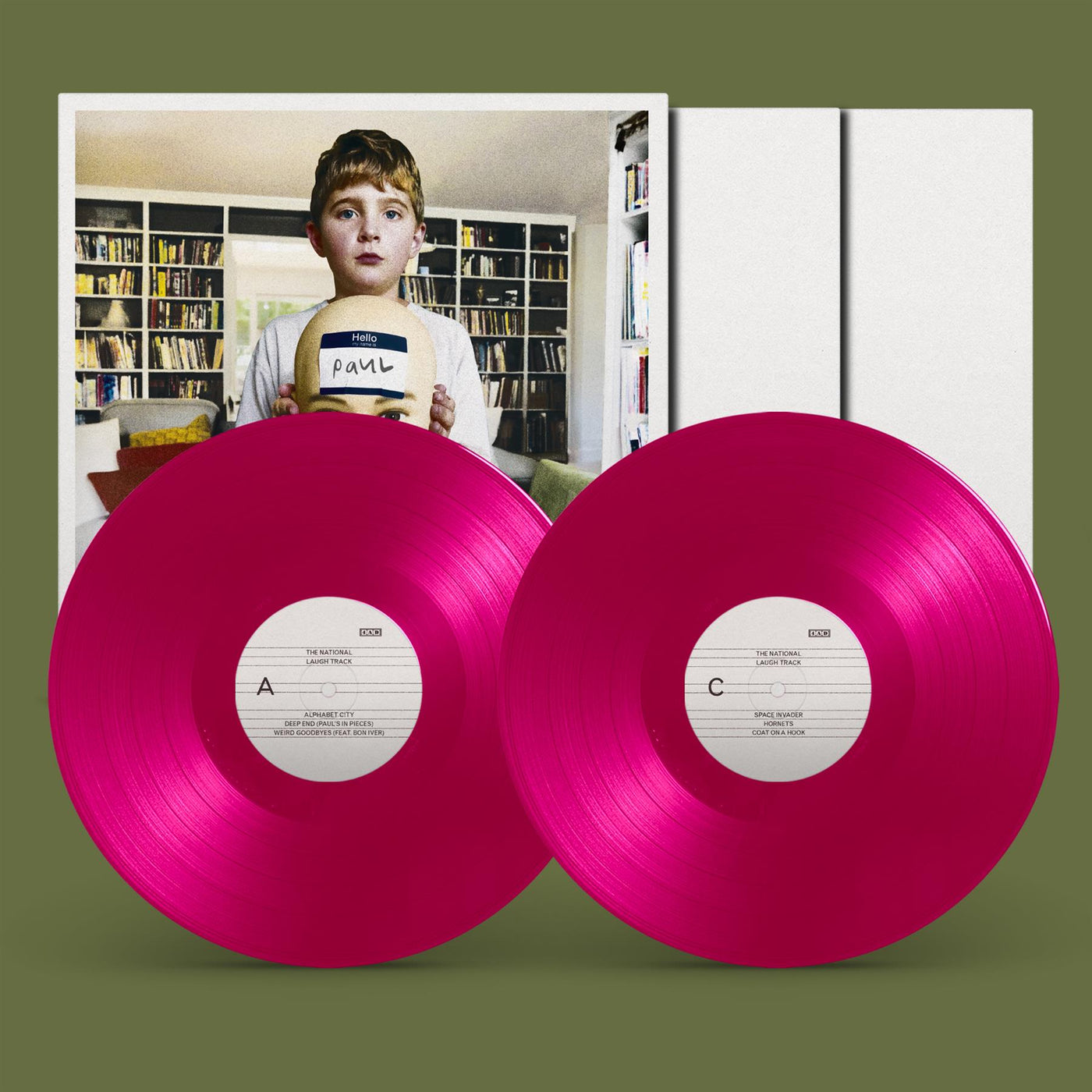 The National ‘Laugh Track’—two magenta vinyl records with inner sleeve (boy holding mannequin head labeled “Paul”)