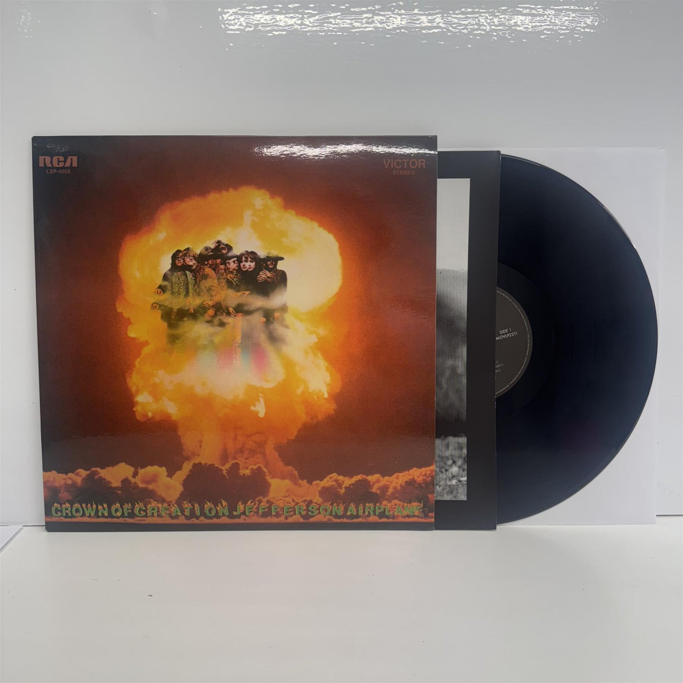 Jefferson Airplane’s Crown of Creation vinyl, featuring the band within a fiery mushroom cloud explosion on the cover.