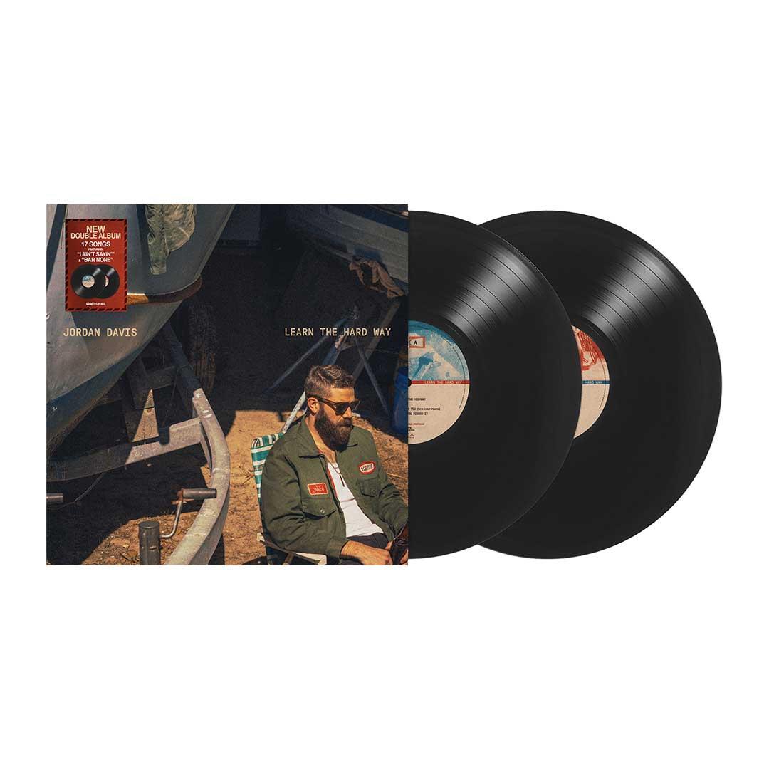 Jordan Davis ‘Learn The Hard Way’—two black LPs with rustic cover photo of artist
